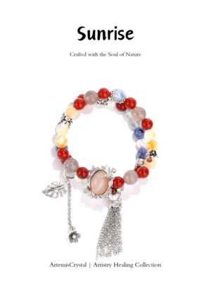 Sunrise art healing creation top view with red agate, gray moonstone, blue lace agate, citrine, pearls, and green chalcedony
