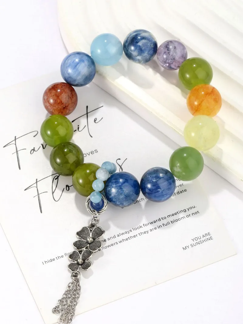 Artistic gemstone bracelet worn on wrist in natural light lifestyle photography